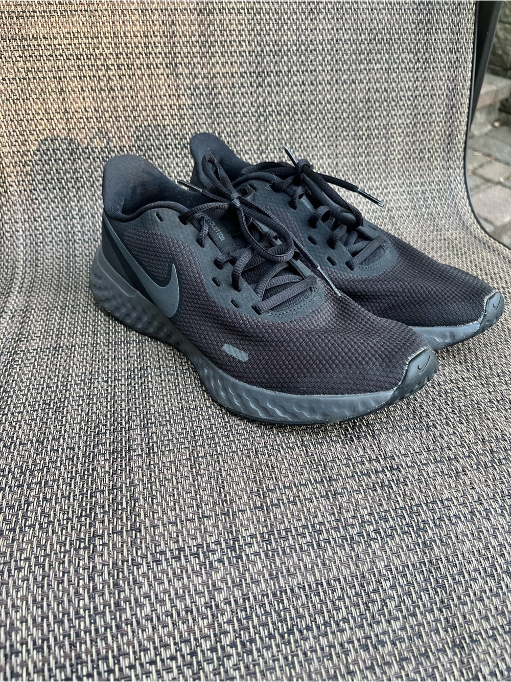Nike Women's Black Athletic Running Shoes with Gray Swoosh